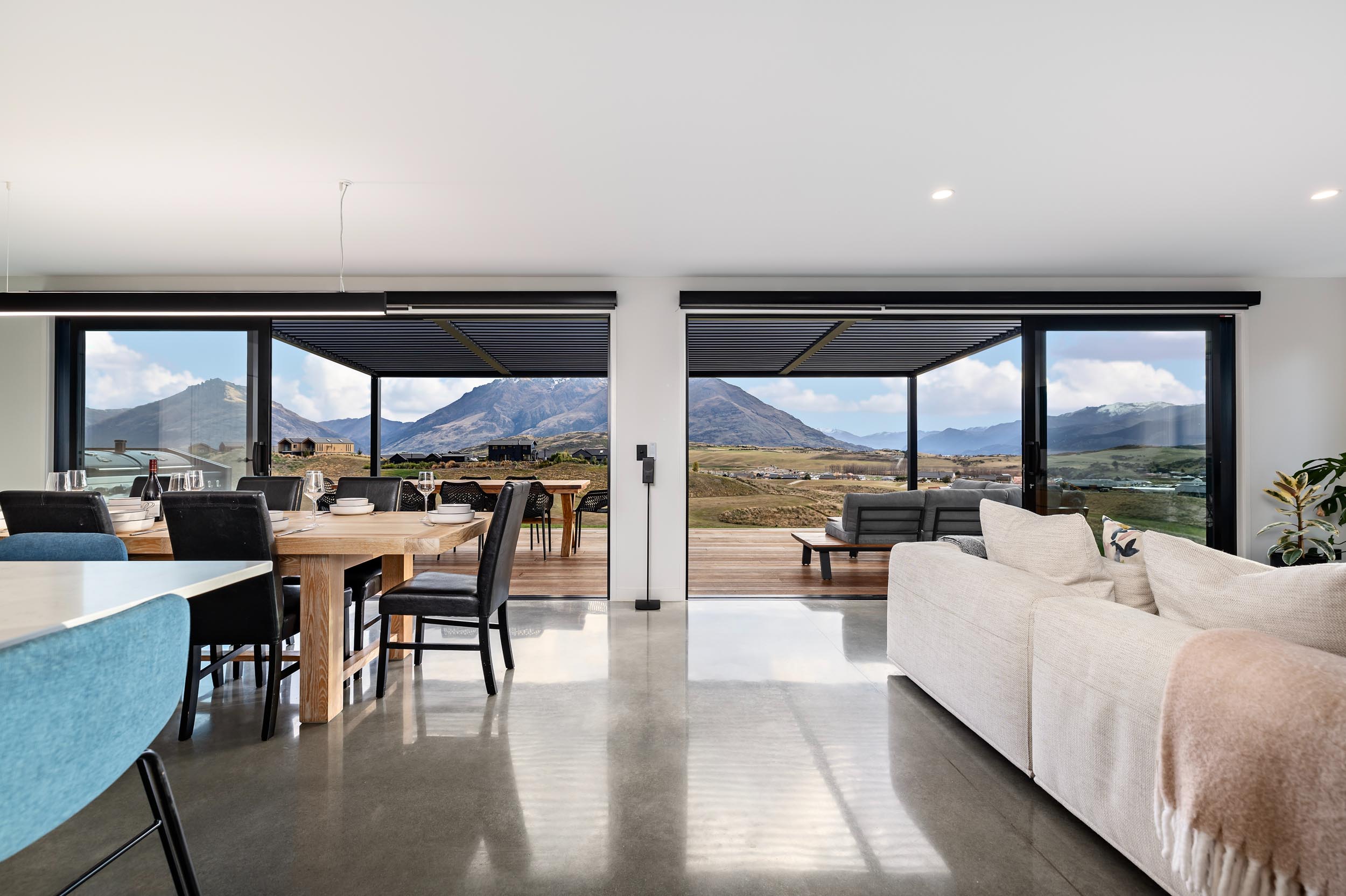 Open-plan house interior with an overlooking scenic landscape | Classic Builders